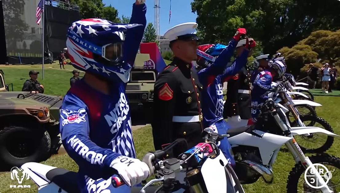 Travis Pastrana performs a backflip in front of the White House